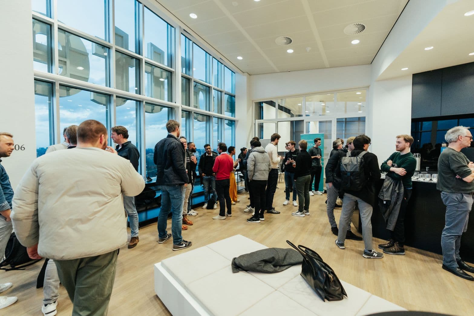 People gathering at a BCNL blockchain event